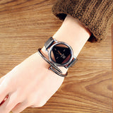 Reloj Triangular