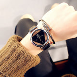 Reloj Triangular